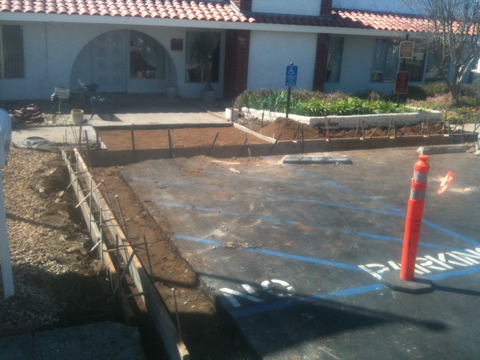 International Paving Services, Inc ADA curb cut ramp