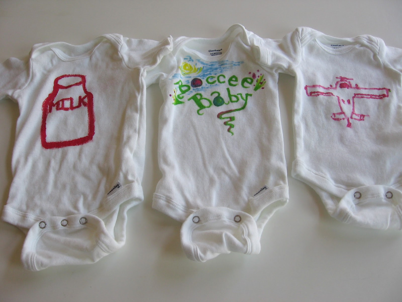 Needle And Spatula Baby Shower Activity Decorating Onesies With
