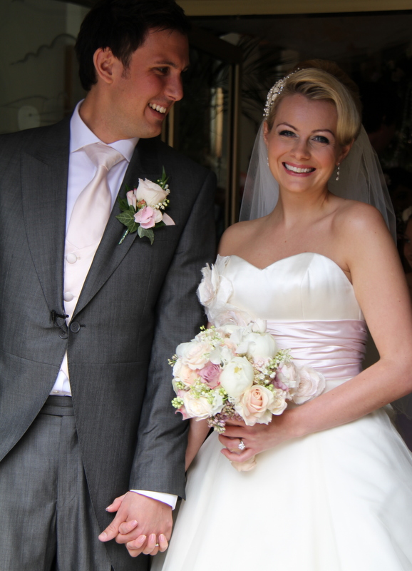Camilla's wedding bouquet was designed to compliment her Phillipa Lepley 