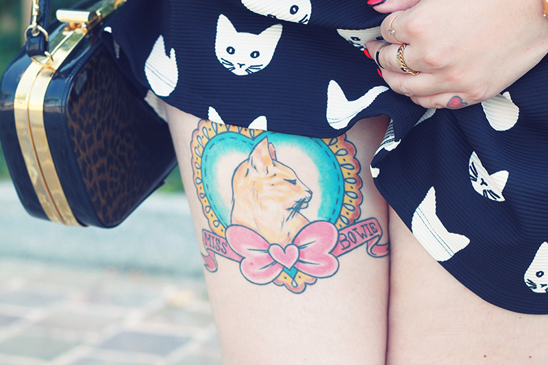 h&m cat dress leg tattoo
