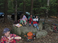 kids on a rock while camping