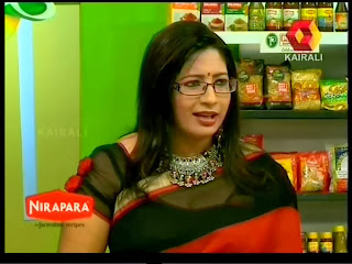 nair lakshmi malayalam saree chef celebrity tv kairali cleavage magic kitchen mallufun