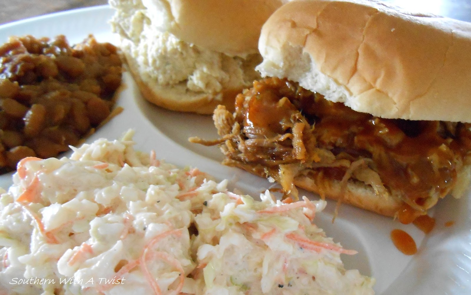 Southern With A Twist BBQ Pulled Pork Sandwiches with Mama's Slaw and Baked Beans... at the 1st