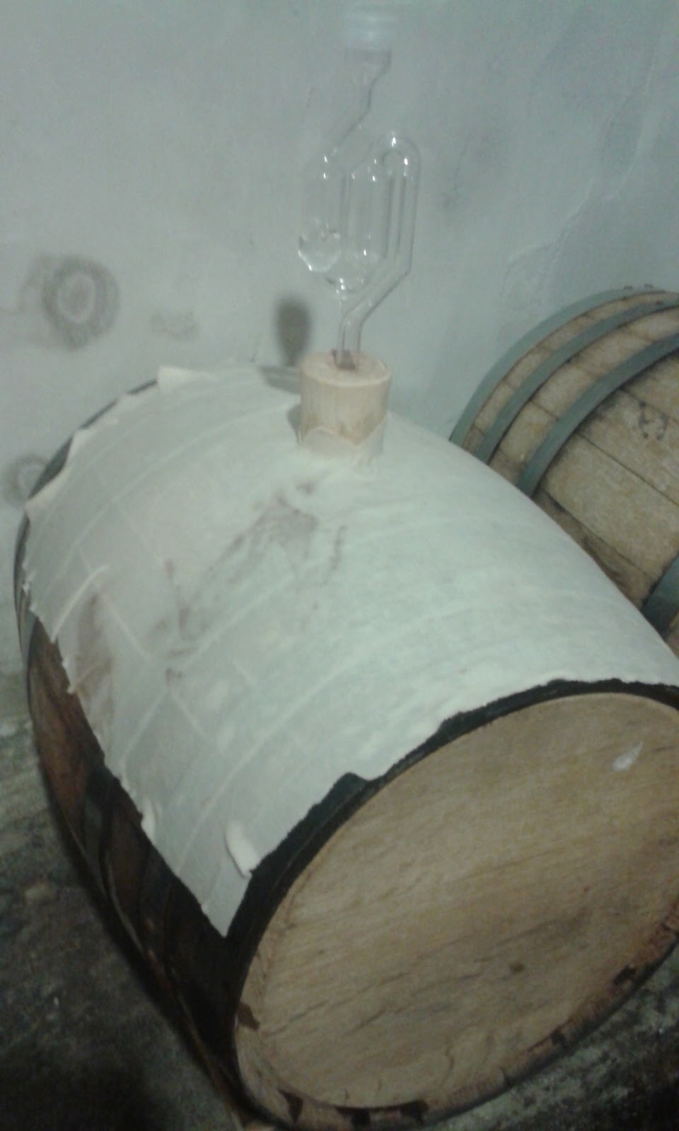 Funk Factory Geuzeria Paraffin waxing a barrel.