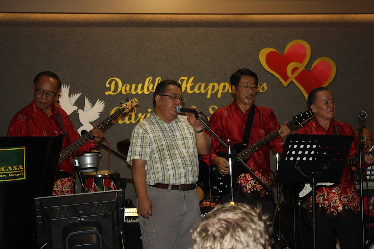 Guest singer Harry Tan singing a song
