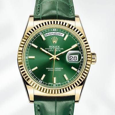 Rolex New Day-Date yellow gold, fluted bezel, green dial and leather strap