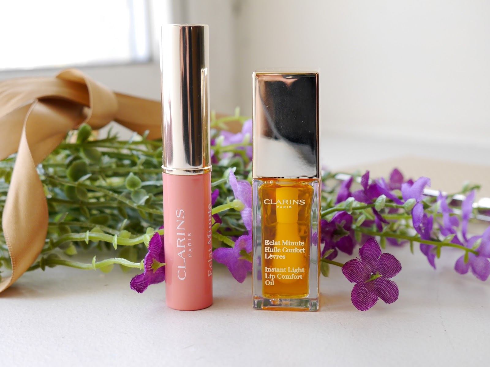 Clarins Lip Comfort Oil and Instant Light Lip Balm Protector* A