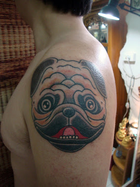 dog by bamboo tattoo tiki phangan thailand