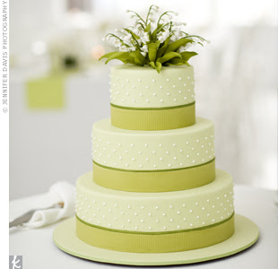 wedding cake with green ribbon detail