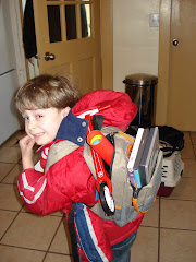 Ethan with bag packed ready to