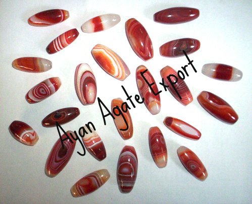 RED ONYX TAPERED PIPE BEADS