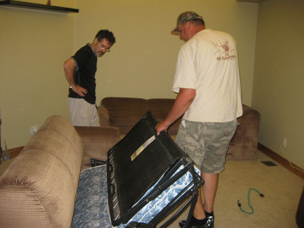 [apt-couch-moving-into-place.jpg]