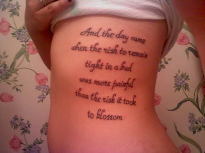 Tattoo of "Risk" by Anais Nin.