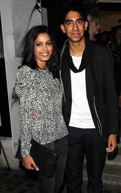 [Freida+Pinto+out+in+London+night+candids+with+dude3.jpg]