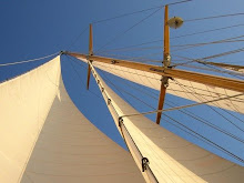 Sails against a blue sky