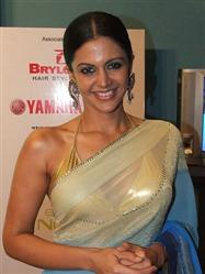 Indian tv actress Mandira bedi in Yellow Transparent Saree