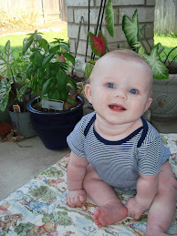 Posing with Mommy's basil