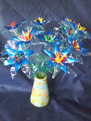 realizzazione fiori con riciclo di bottiglie di plastica