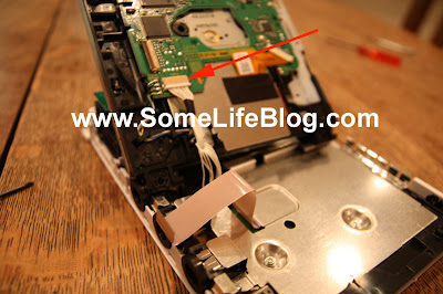 Wii DVD Replacement: With the data cable and clip removed, now remove the power plug from the socket by lightly prying on the plug. Do not pull on the wires or you can ruin the cables on plug. Once the power cable is removed, the DVD drive can be removed from the Nintendo Wii. Wii DVD Replacement: With the data cable and clip removed, now remove the power plug from the socket by lightly prying on the plug. Do not pull on the wires or you can ruin the cables on plug. Once the power cable is removed, the DVD drive can be removed from the Nintendo Wii.