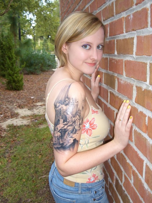 girls with arm tattoos. 2011 Arm Tattoo Design For