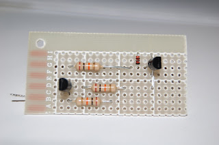 soldered components on a strip board for the Two Transistor aldl Circuit for connecting to gm obd1