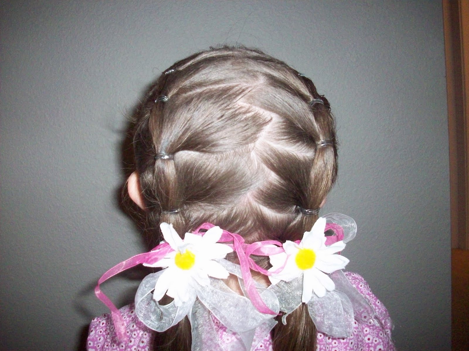 My Little one's hair Zig Zag rubber band pigtails