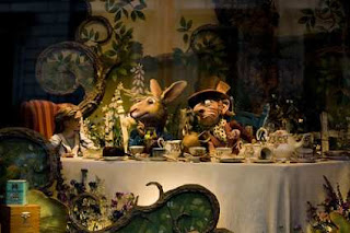 Alice. The March Hare, The Mad Hatter and the Dormouse at tea