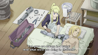 Winry cares for Ed's automail arm