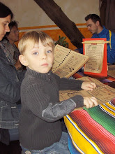 Noah checking out the menu at a Mexican restaurant...in Austria.