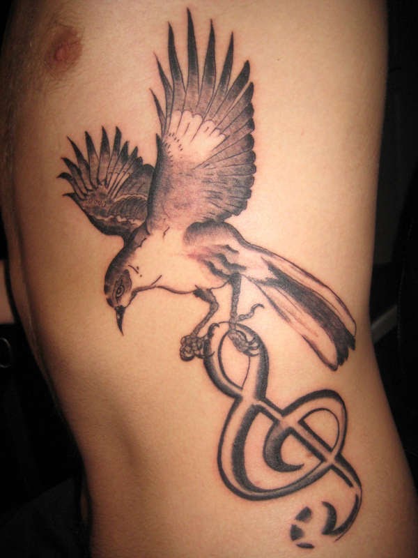 small bird tattoo. small bird tattoo. small bird