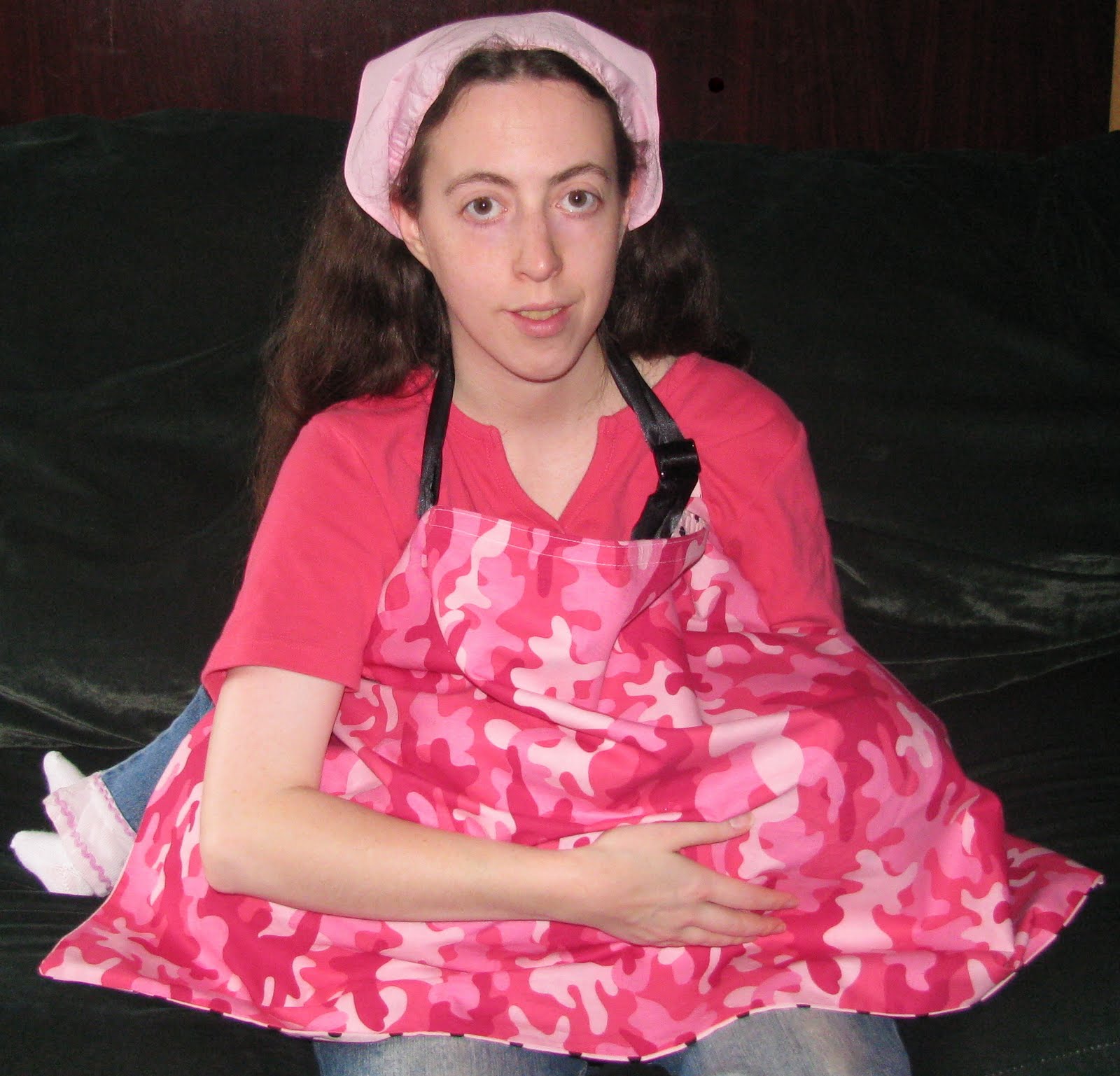 Women+breastfeeding+cat