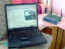 The notebook is connected to the wireless access point using a PC card wireless card.