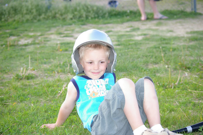 Charlie enjoying a rest with his batting helmet on!