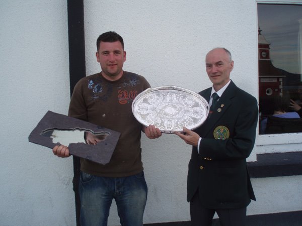 Winner of Munster Open "Dave Finnegan" being presented with prize by Munster sectary Pete Davis