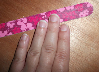 Girl+filing+nails