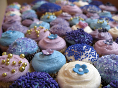 Here 39s a neat selection of blue and lilac cupcakes for Amy 39s wedding