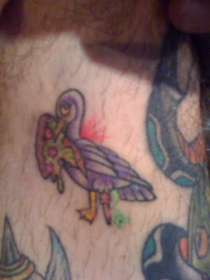 Marty-Olde City Tattoo..I like funny little tats! third dimension.
