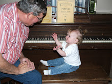 Carey and Grandpa Fred at the piano.