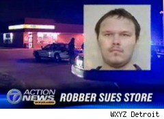 [robber+sues+store.jpg]