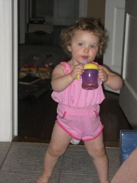 A REAL Southern Belle- note the soggy diaper paired with a much too small romper