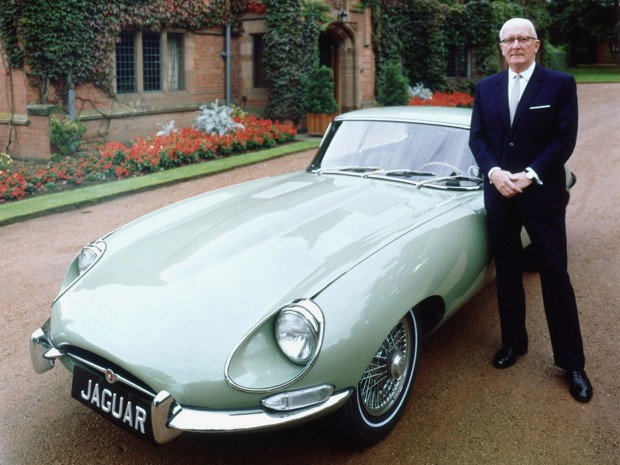 Sir William Lyons with an E Type Jaguar outside Wappenbury Hall