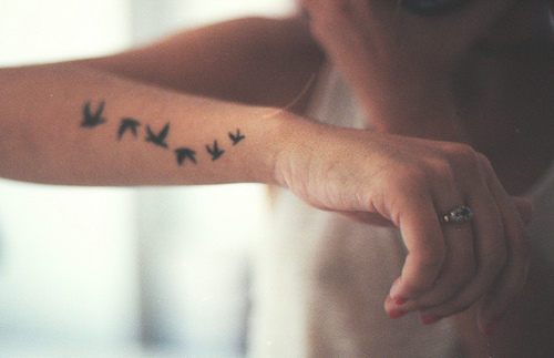 These tattoos of flying birds have been quite popular lately at least in