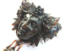 Tortoise shell carving of Bacchus