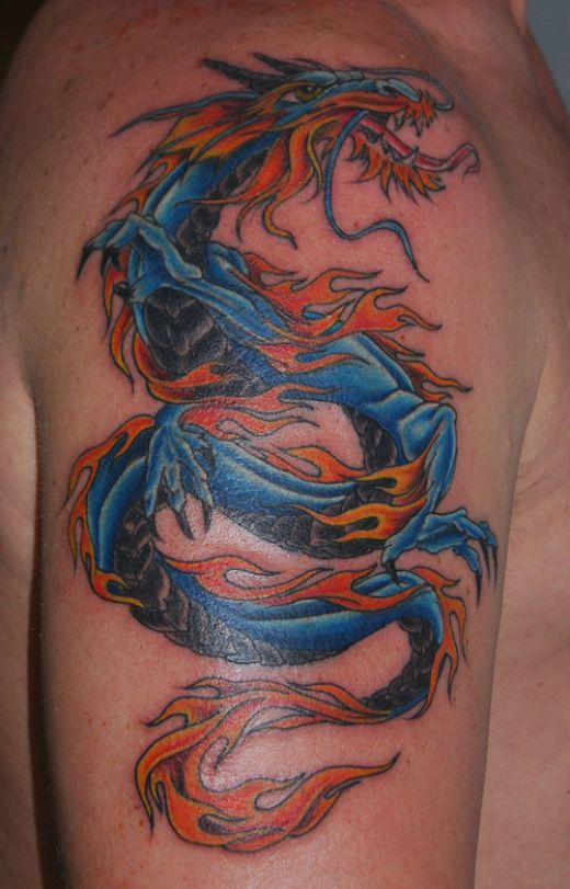Deff this dragon tattoo belongs to a man by the look of his muscles so 