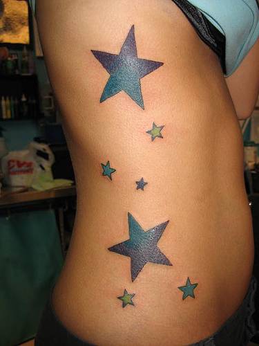 star tattoos on wrist. 3 star tattoos.