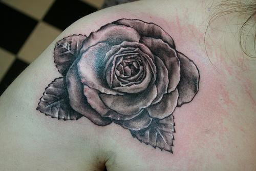 My fourth Black Rose Tattoo is this chick who declares My Love is a Black 