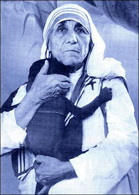 Mother Teresa with a baby