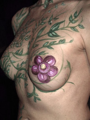 A Sexy Woman With A Flower Body Painting Art