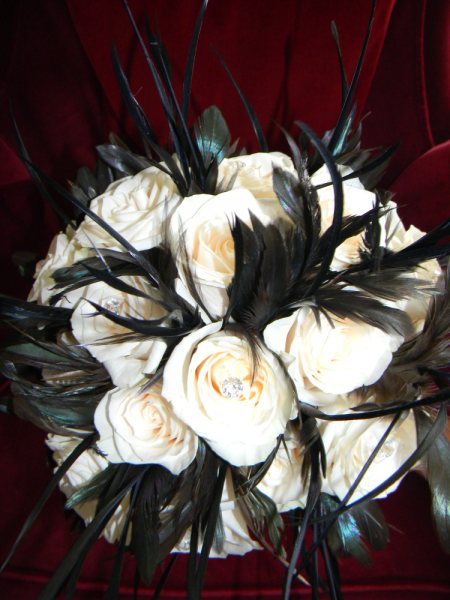 Rhonda 39s bouquet is white roses with crystals in each centre and tuffs of 