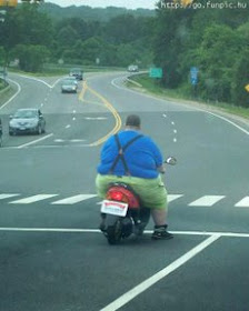 fat man on monkey bike